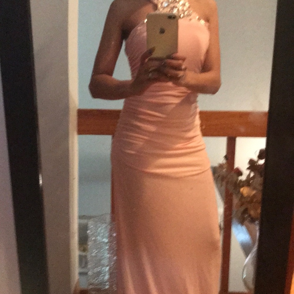 Cache long pink dress with rhinestones on front.
